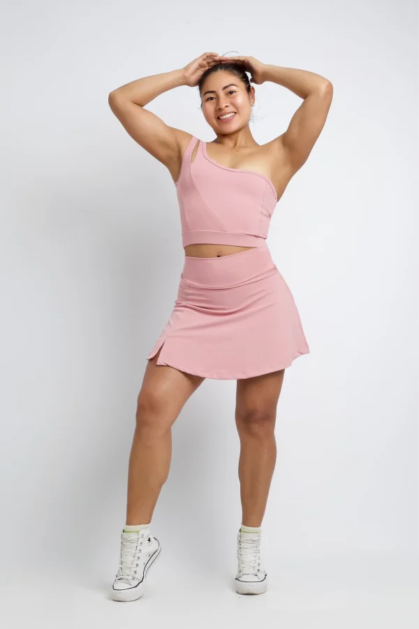 Conjunto-deportivo-coral-para mujer-con-top-y-falda-short-fitness